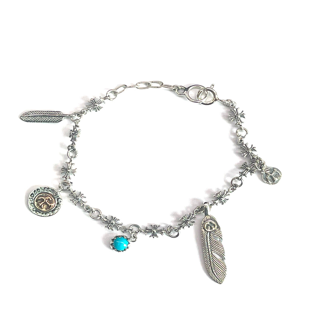 Cross pattern silver bracelet with turquoise & feather