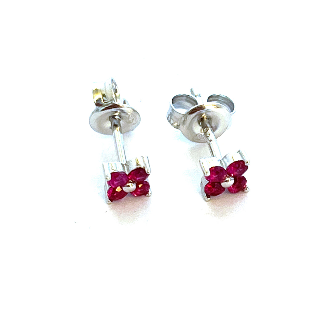 Four small purple stone silver studs earring