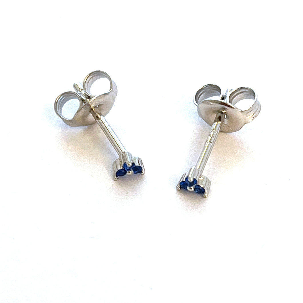 Three small blue stone silver studs earring