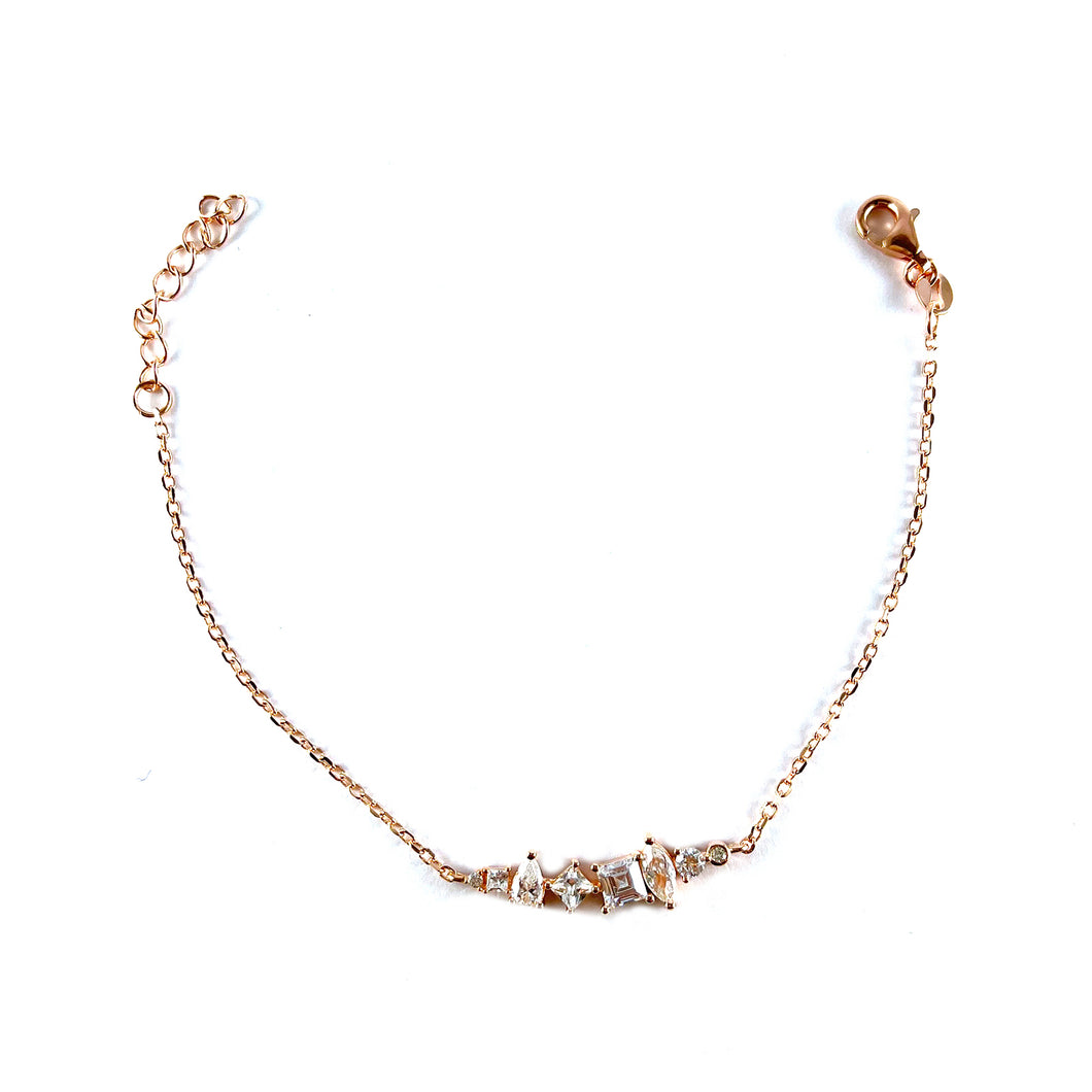 Different shape white CZ silver bracelet with pink gold plating