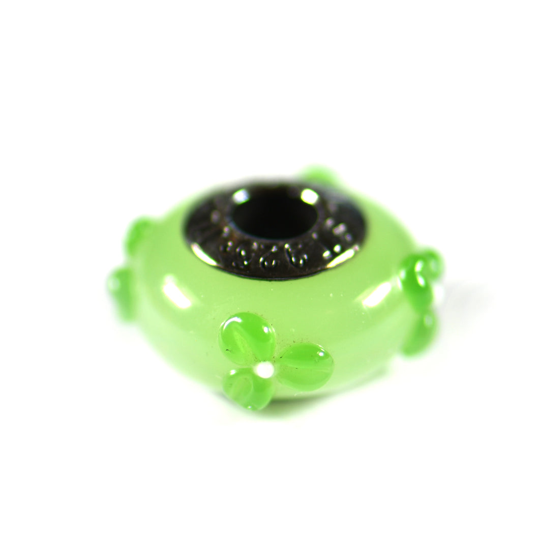 Silver beads with green glass & flower