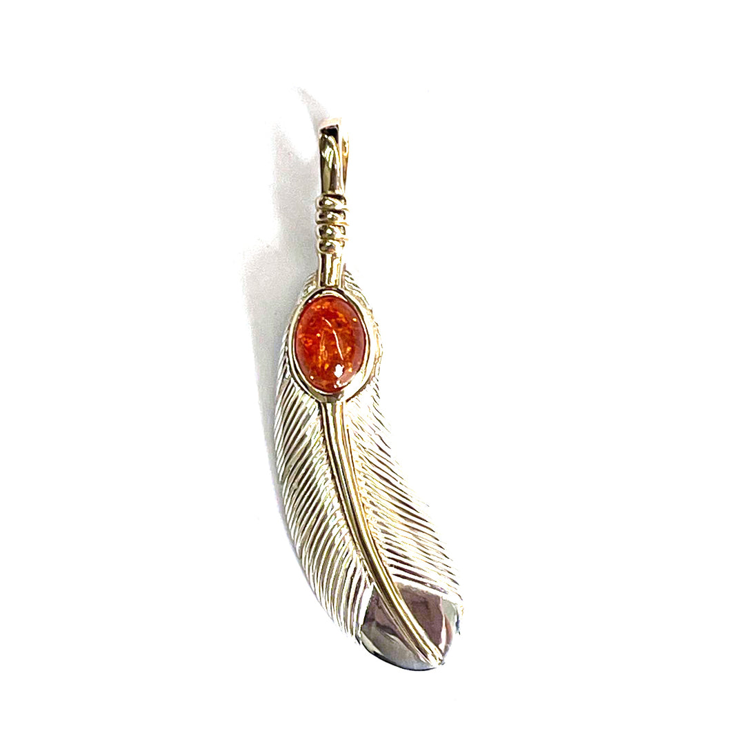 Feather silver pendant with amber