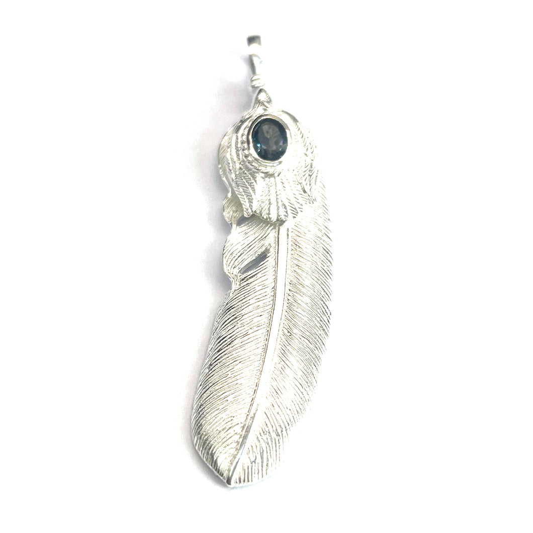 Feather silver pendant with London blue Topaz