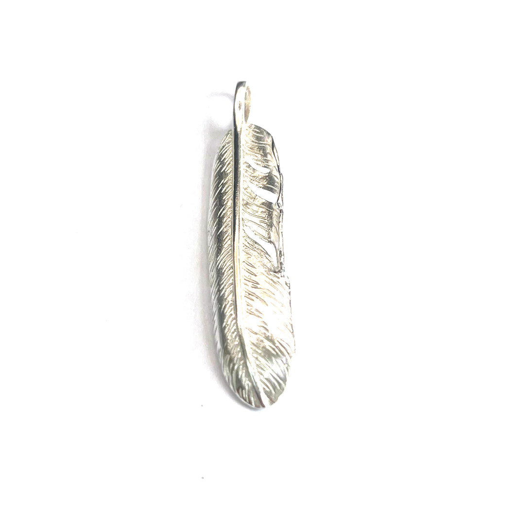 Medium size feather silver pendant
