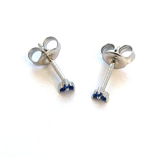 Three small blue stone silver studs earring