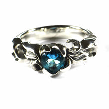 Aquarelle pattern silver ring with blue CZ