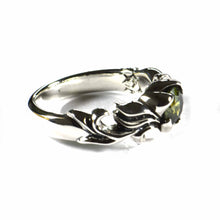 Aquarelle pattern silver ring with green CZ