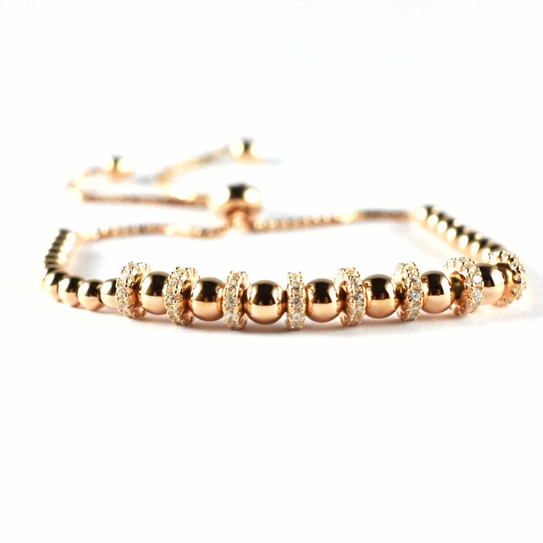 Ball pattern silver bracelet with white CZ & pink gold plating