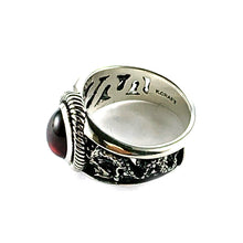Big garnet silver ring with dragon pattern