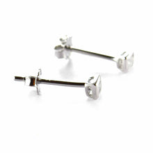 Channel set silver studs earring with CZ