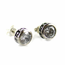 Channel set silver studs earring with white CZ & small white CZ