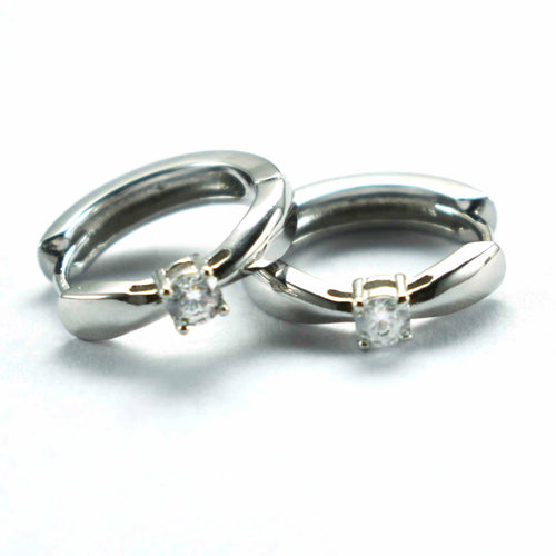 Circle earring with one white CZ