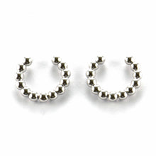 Cuff silver earring with ball pattern