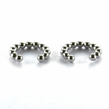 Cuff silver earring with ball pattern