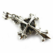 Double cross silver pendant with green CZ