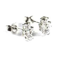 Four CZ silver studs earring