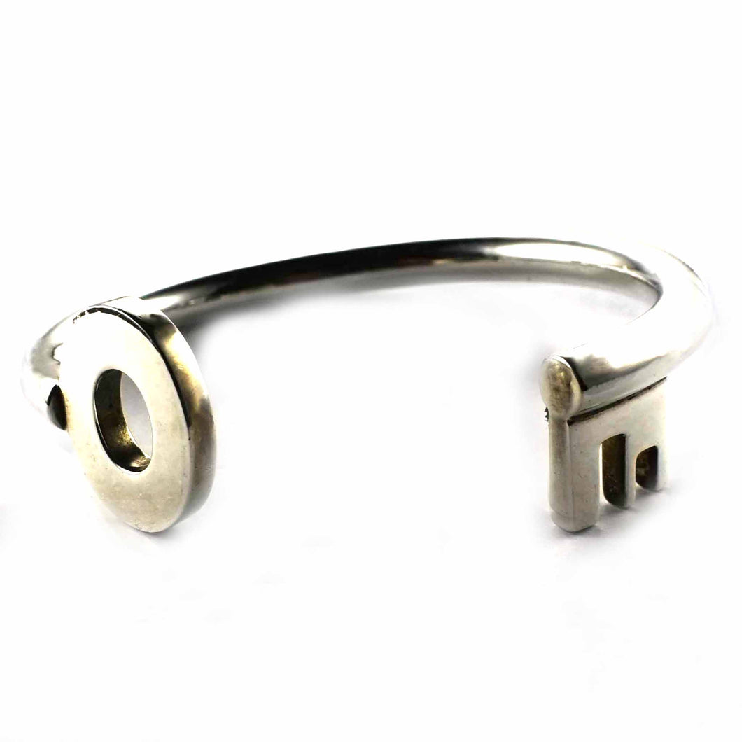 Key silver bangle