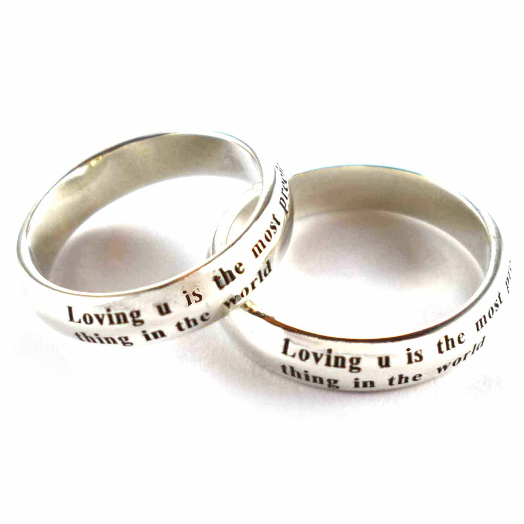 Loving u is the most precious silver couple ring