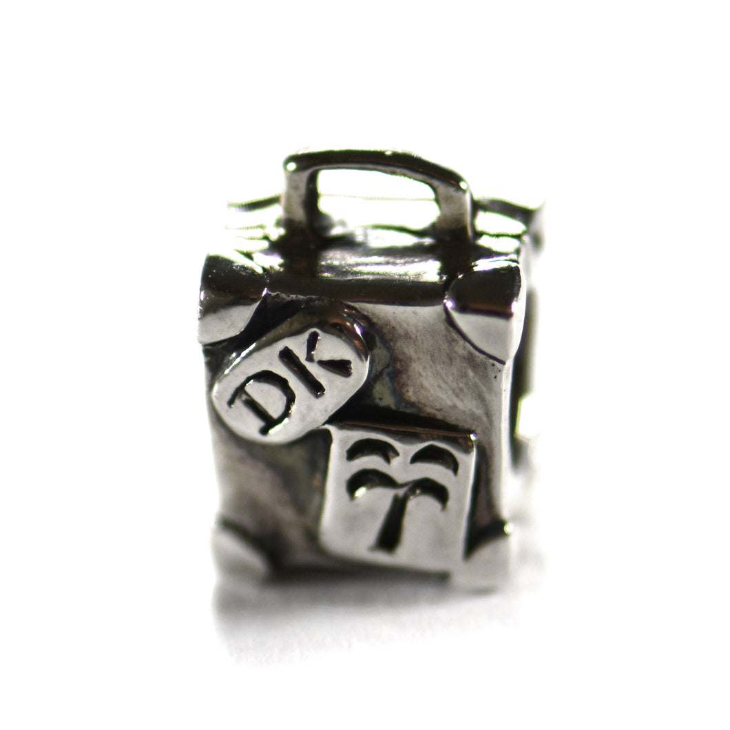Luggage silver beads