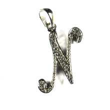 N silver pendant with 18K gold plating