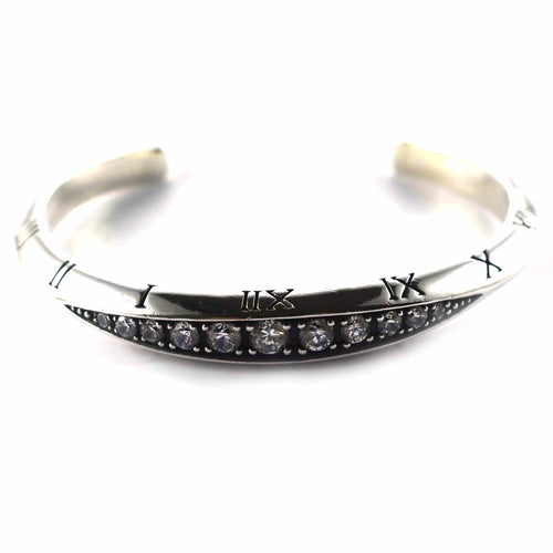 Roman numerals with white cubic zirconia
