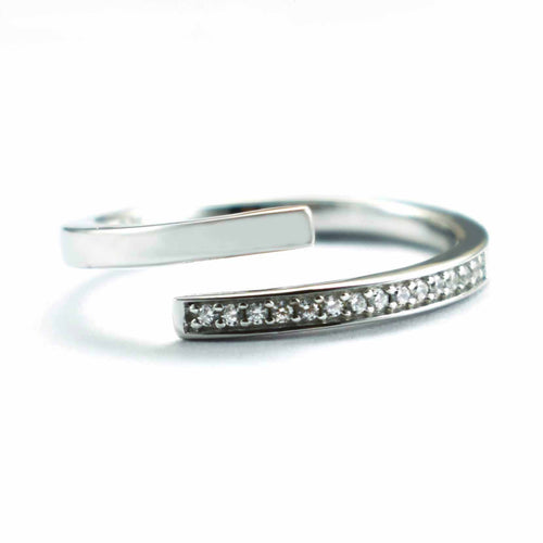 Open silver ring with white CZ