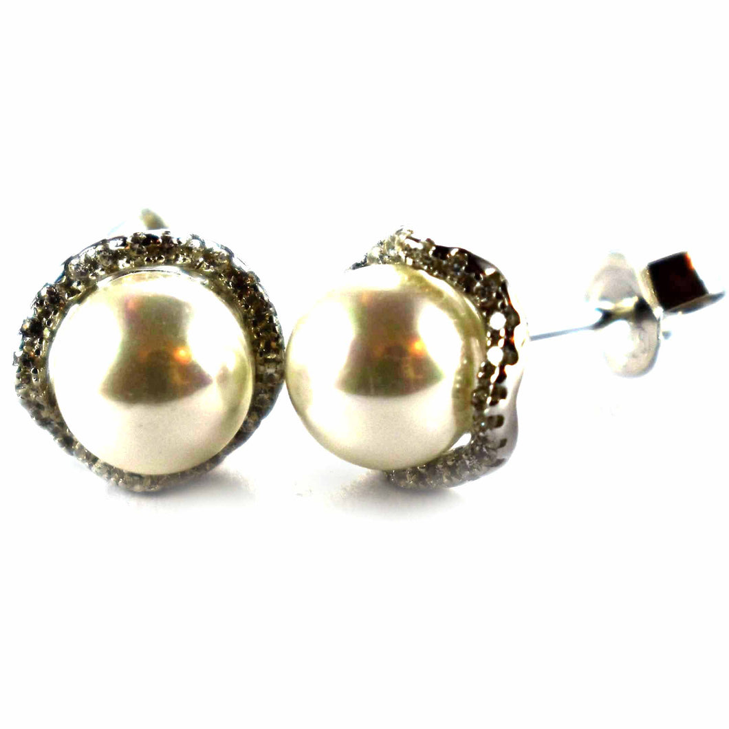 Pearl silver earring with a round of white cubic zirconia