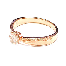 Prong set silver ring with white CZ & pink gold plating