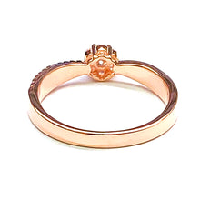 Prong set silver ring with white CZ & pink gold plating