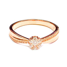 Prong set silver ring with white CZ & pink gold plating