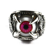 Red eye silver ring with dragon pattern