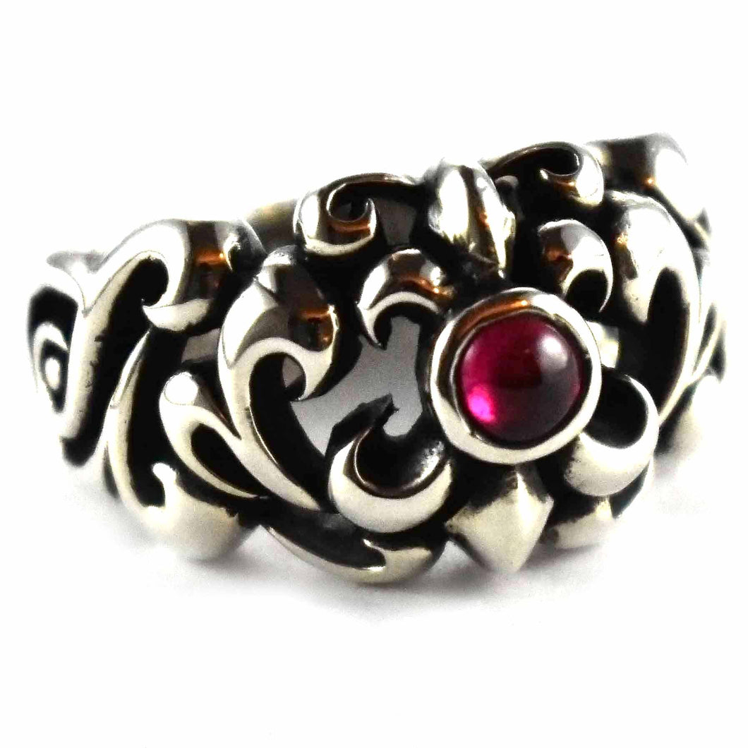 Scout pattern with garnet stone silver ring