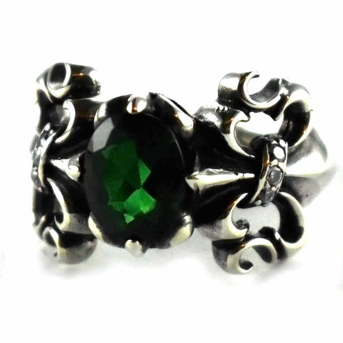 Scout pattern with oval green cubic zirconia silver ring