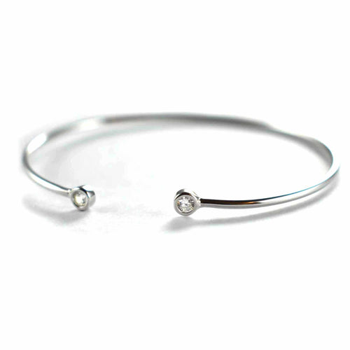 Silver bangle with channel set CZ & platinum plating