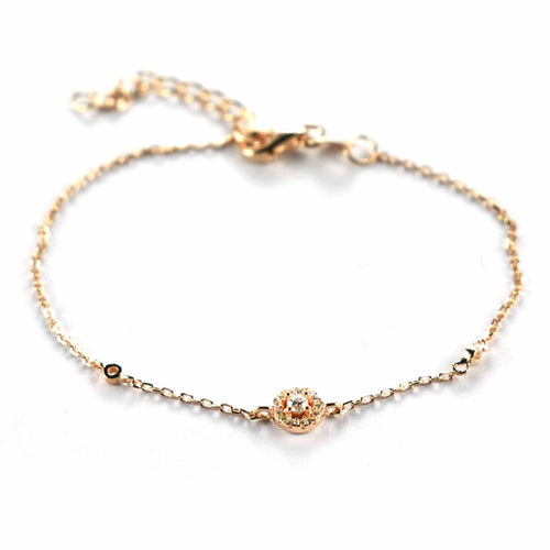 Silver bracelet with big & small CZ & pink gold plating