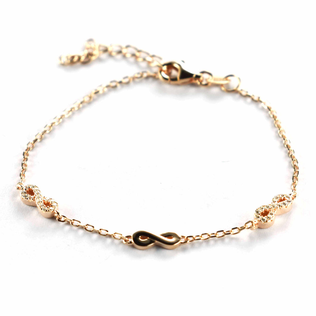Silver bracelet with bow pattern & pink gold plating
