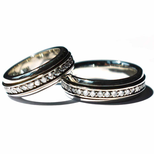 Silver couple ring with a round of white CZ