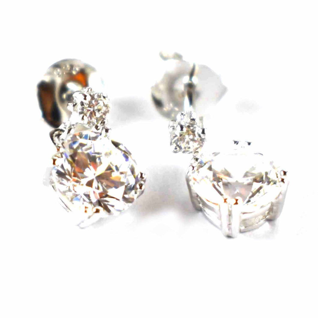 Silver earring with claw set white CZ