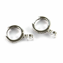 Silver earring with round of white CZ