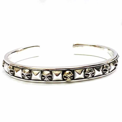 Skull & rivet silver bangle