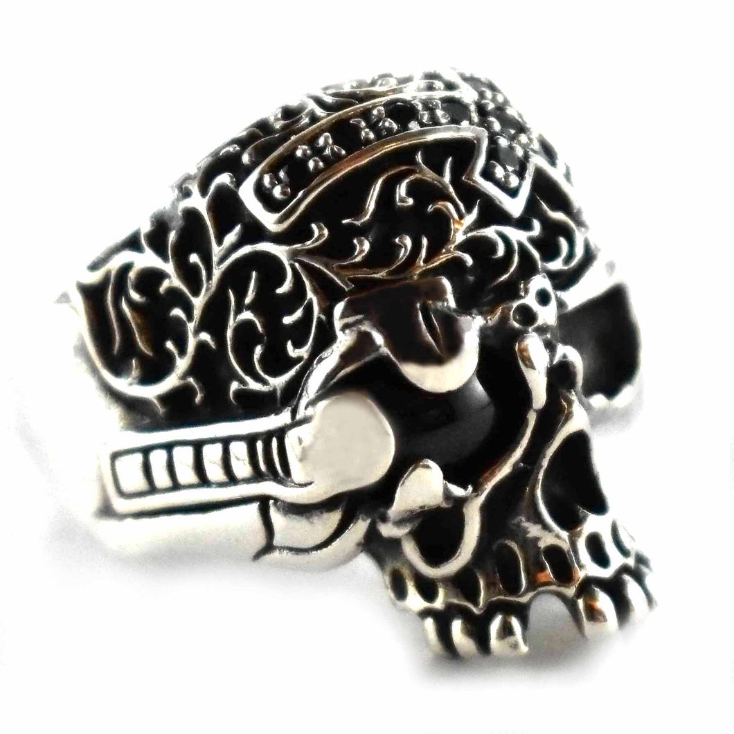Skull with black oval silver ring
