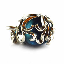 Small ball silver pendant with blue stone