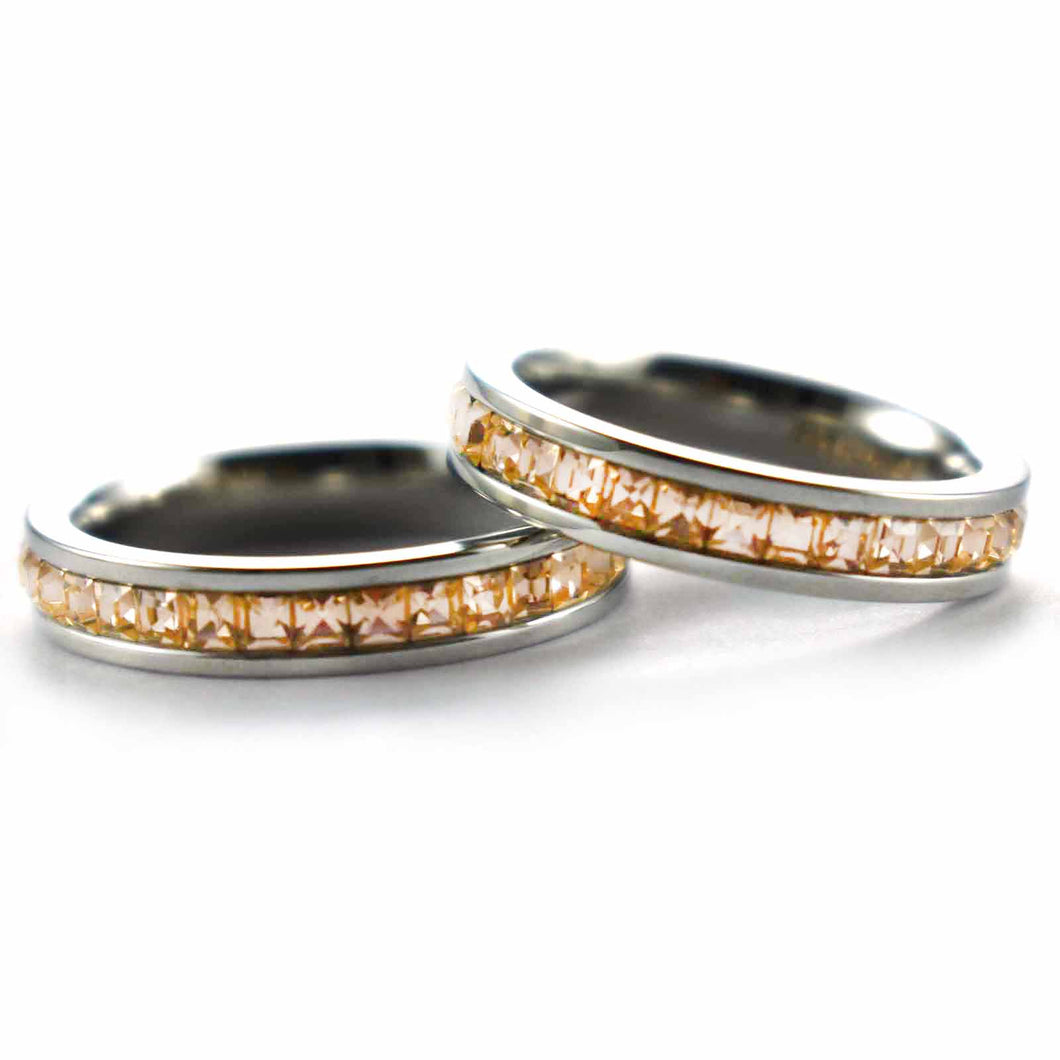 Stainless steel couple ring with champagne cubic zirconia