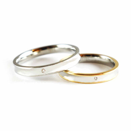 Stainless steel couple ring with pink gold plating & white CZ