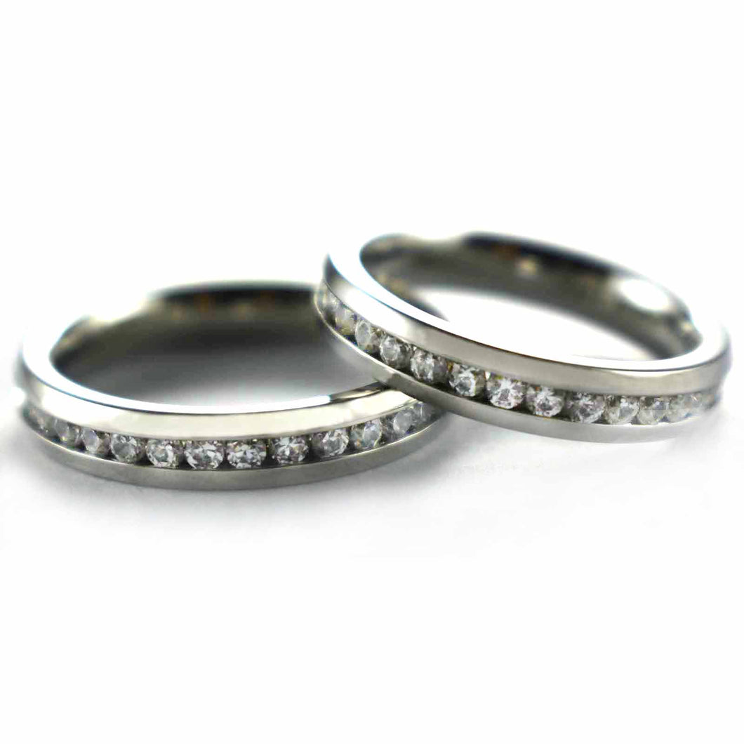 Stainless steel couple ring with round of white CZ