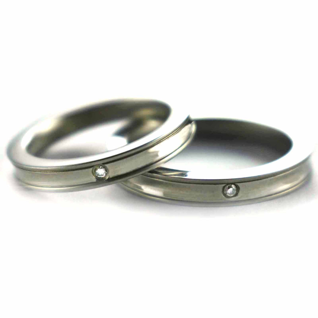 Stainless steel couple ring with round pattern & CZ