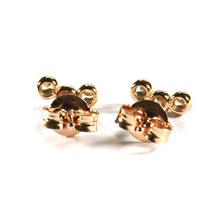 Three CZ silver studs earring with pink gold plating