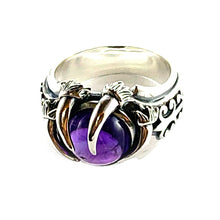 Three claw silver ring with purple stone