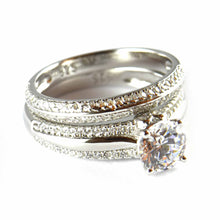 Two piece silver wedding ring with CZ