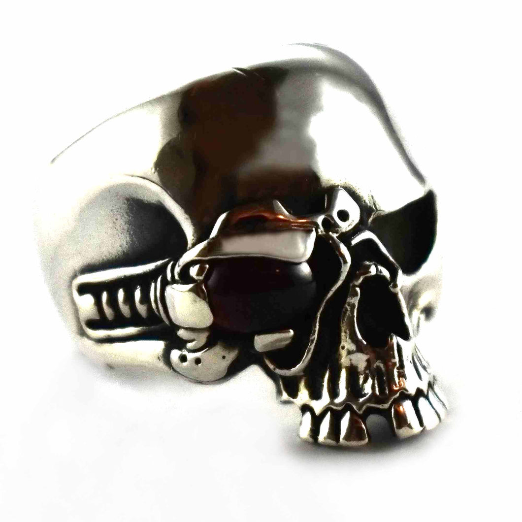 skull ring with black oval stone in eye silver ring